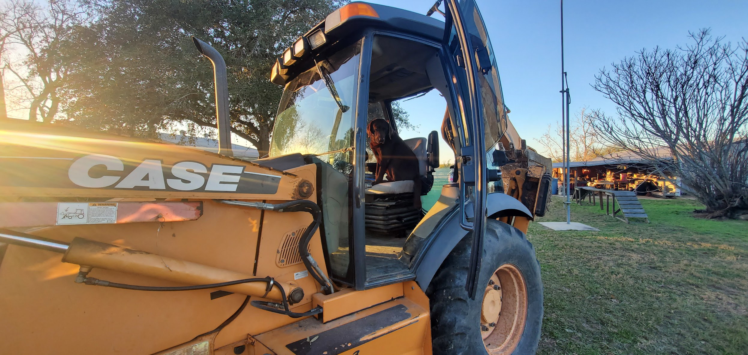 Backhoe at Geigle utilities jobsite in Victoria, Texas
